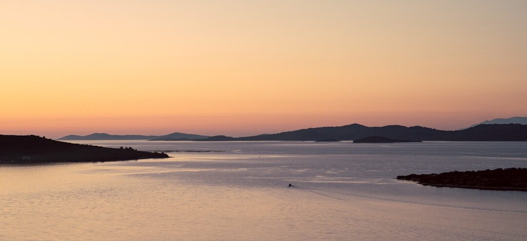 Aerial view of a secluded Adriatic bay at dawn