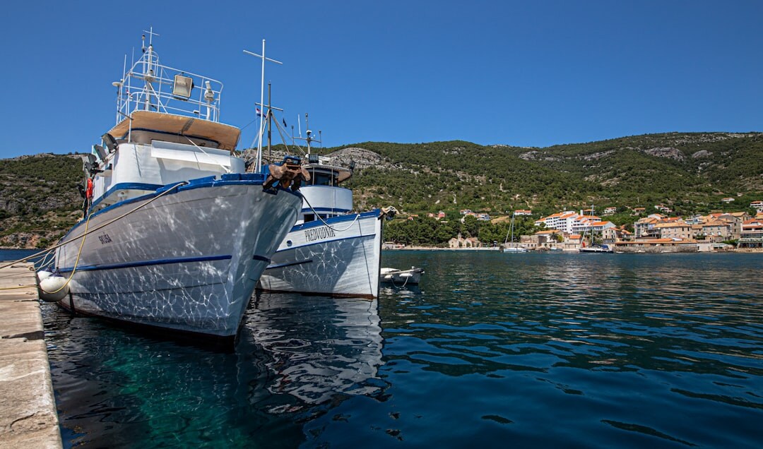 Quiet cove on the island of Vis with fishing huts
