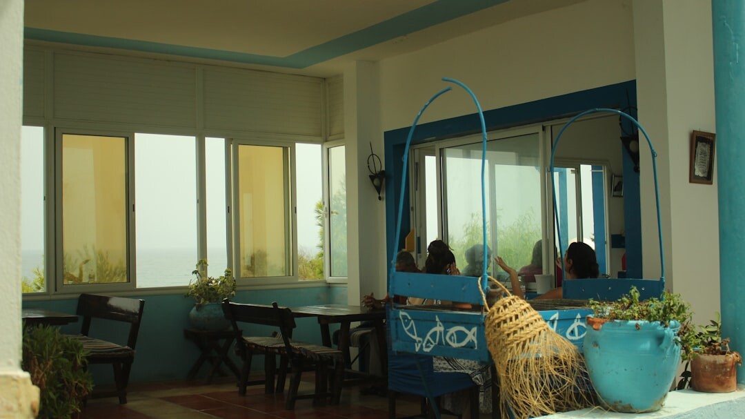 Elegant hotel lobby with sea view windows